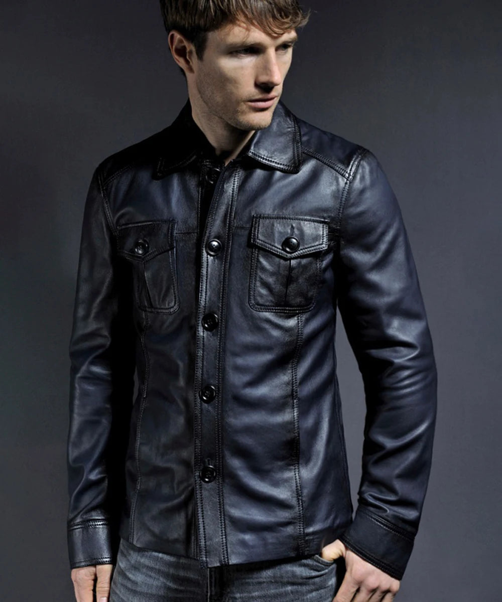 Model wearing vintage blue leather shirt jacket with slim fit styling and classic button front design