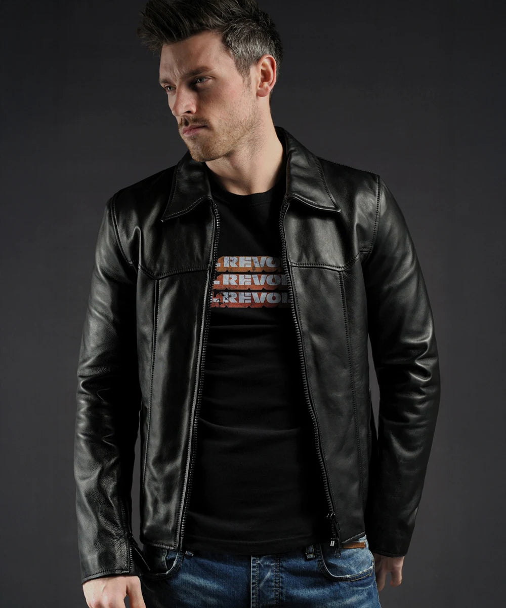 Model wearing vintage black leather jacket with slim fit styling and distinctive seam detailing