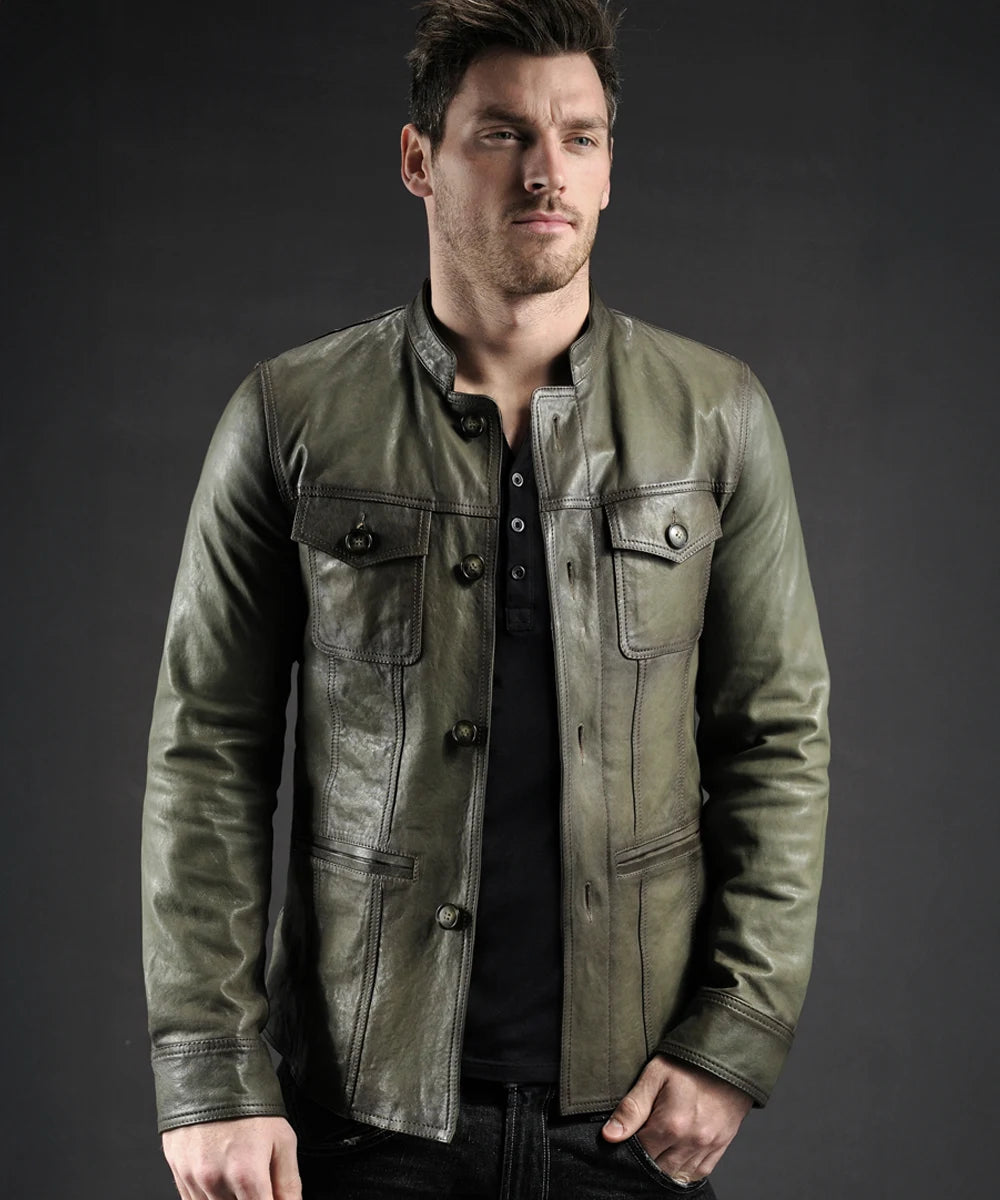 Model wearing vintage black leather shirt jacket with slim fit styling and button front design
