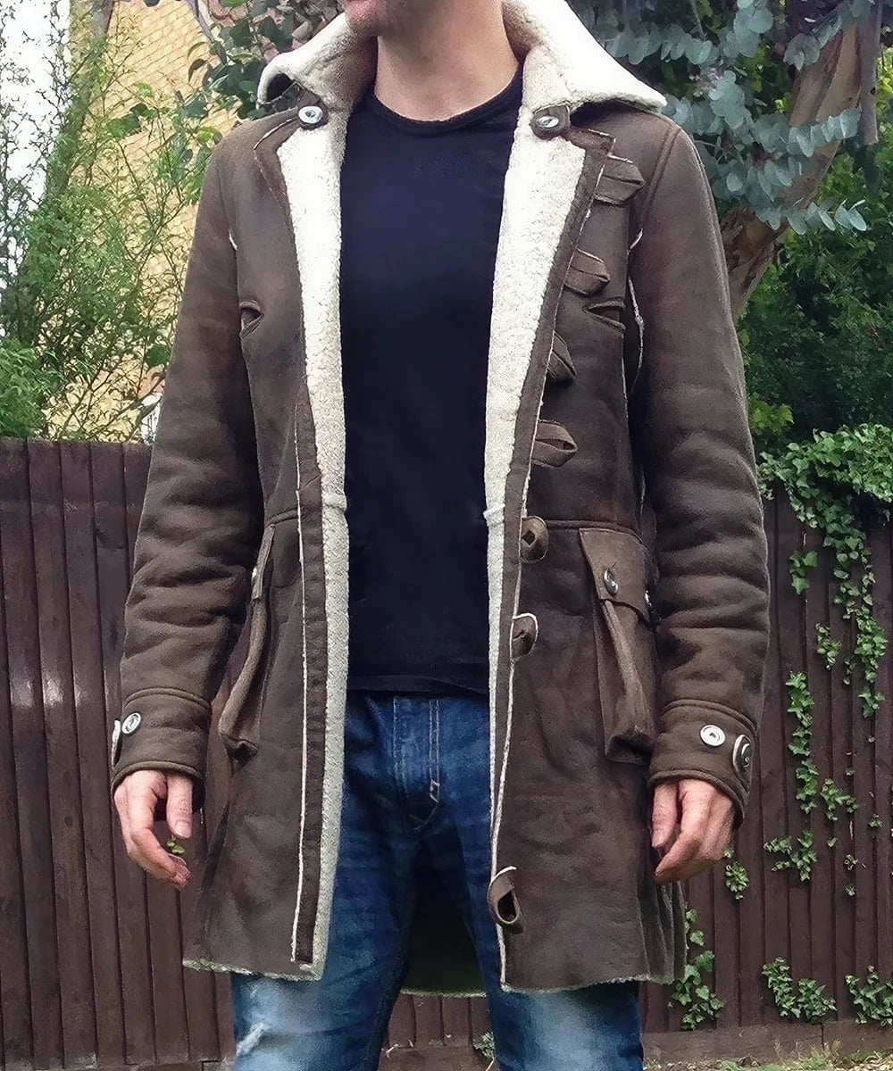 Model wearing brown Bane Italian shearling coat outdoors with open front and wool collar
