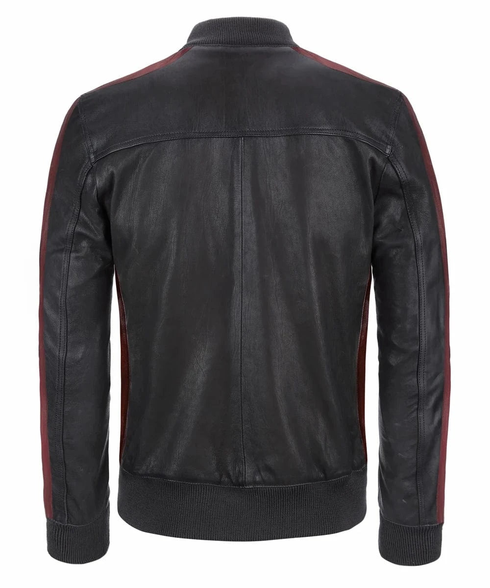 Back view of vintage black leather bomber jacket with slim fit styling, ribbed knit trim, and contrast red leather detailing