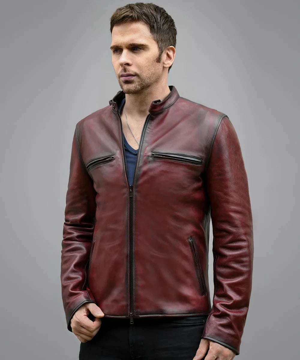Model wearing red cafe racer leather jacket with stand collar and zip chest pockets