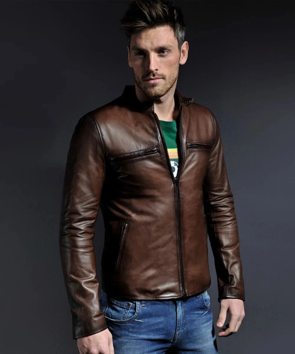 Model wearing brown cafe racer leather jacket with zip front and slim fit silhouette