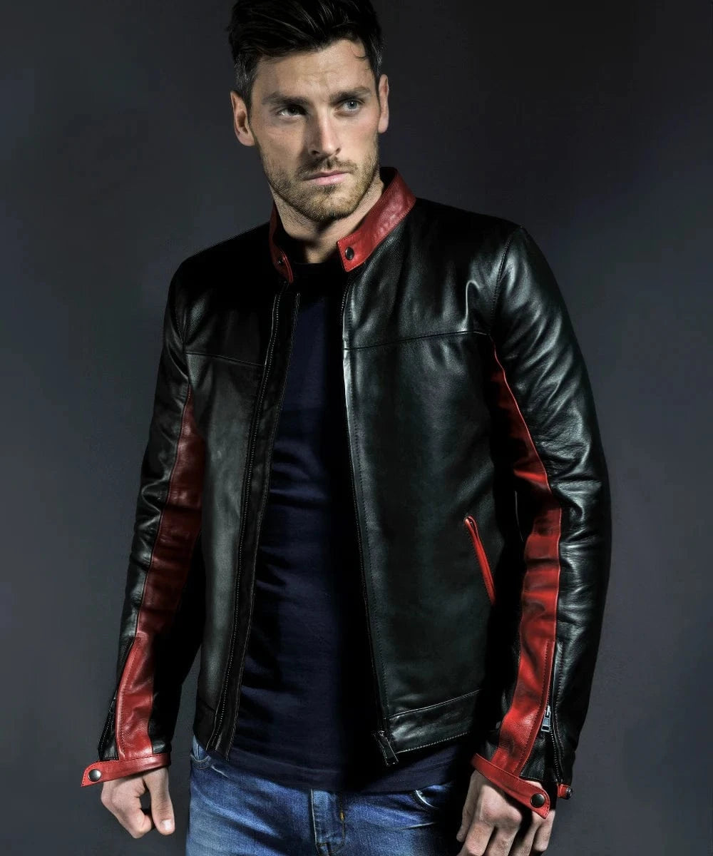 Model wearing black Crusader replica leather jacket with red sleeve panels and zip front style