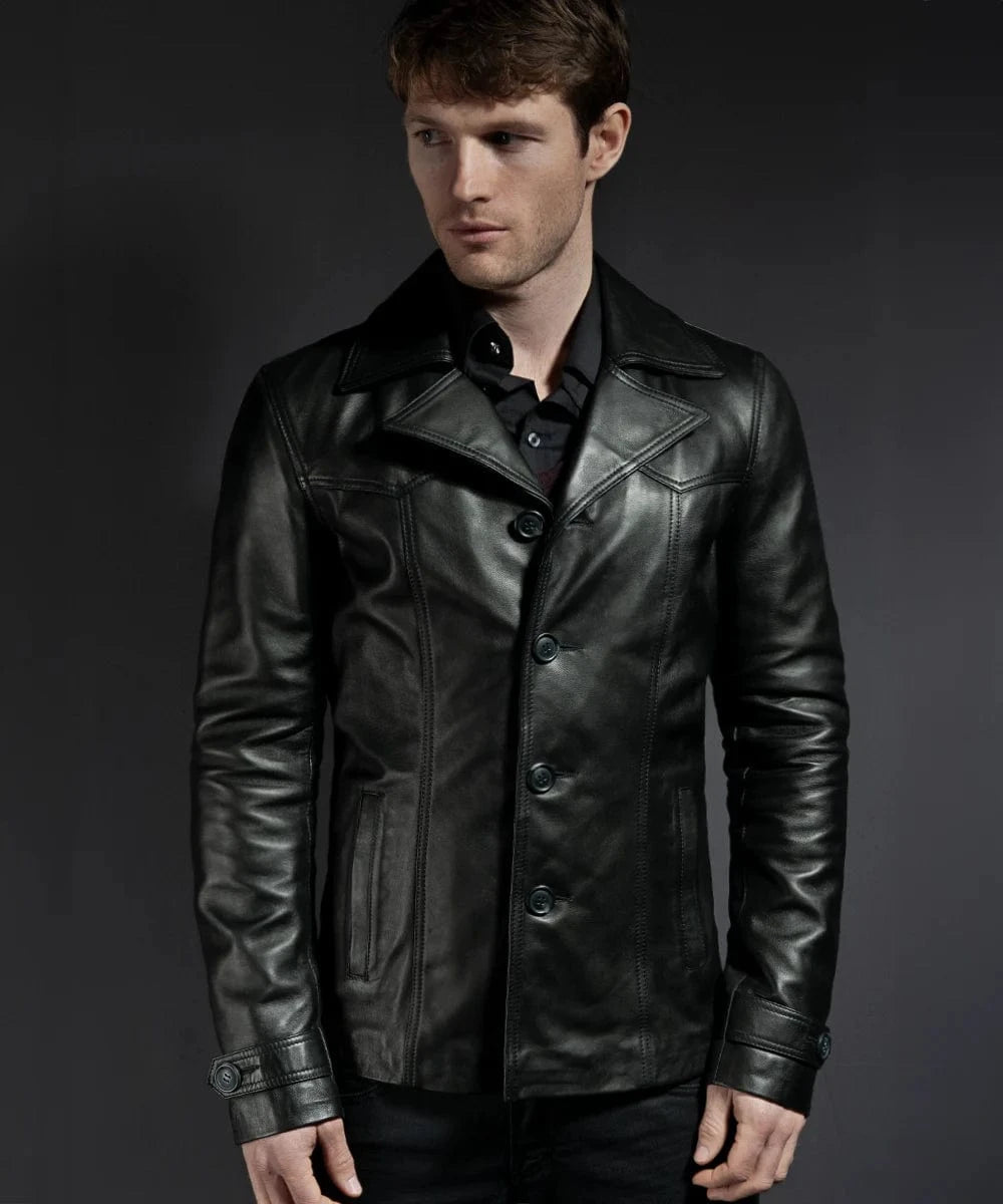 Model wearing vintage slim fit black leather jacket with retro lapel styling and tailored button front design