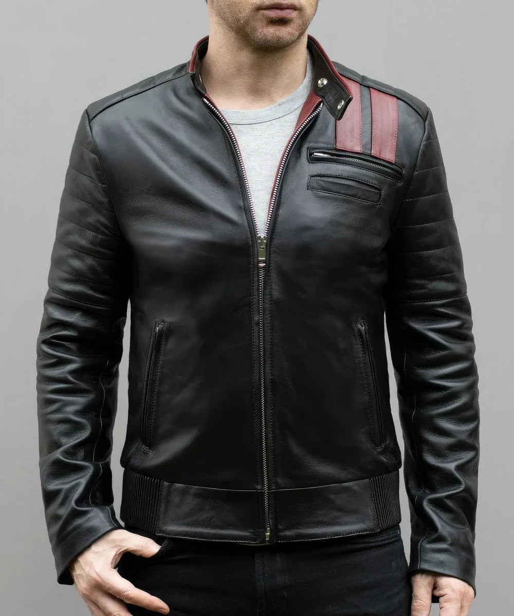 Model wearing vintage slim fit black leather cafe racer jacket with red stripe detailing and quilted shoulder panels