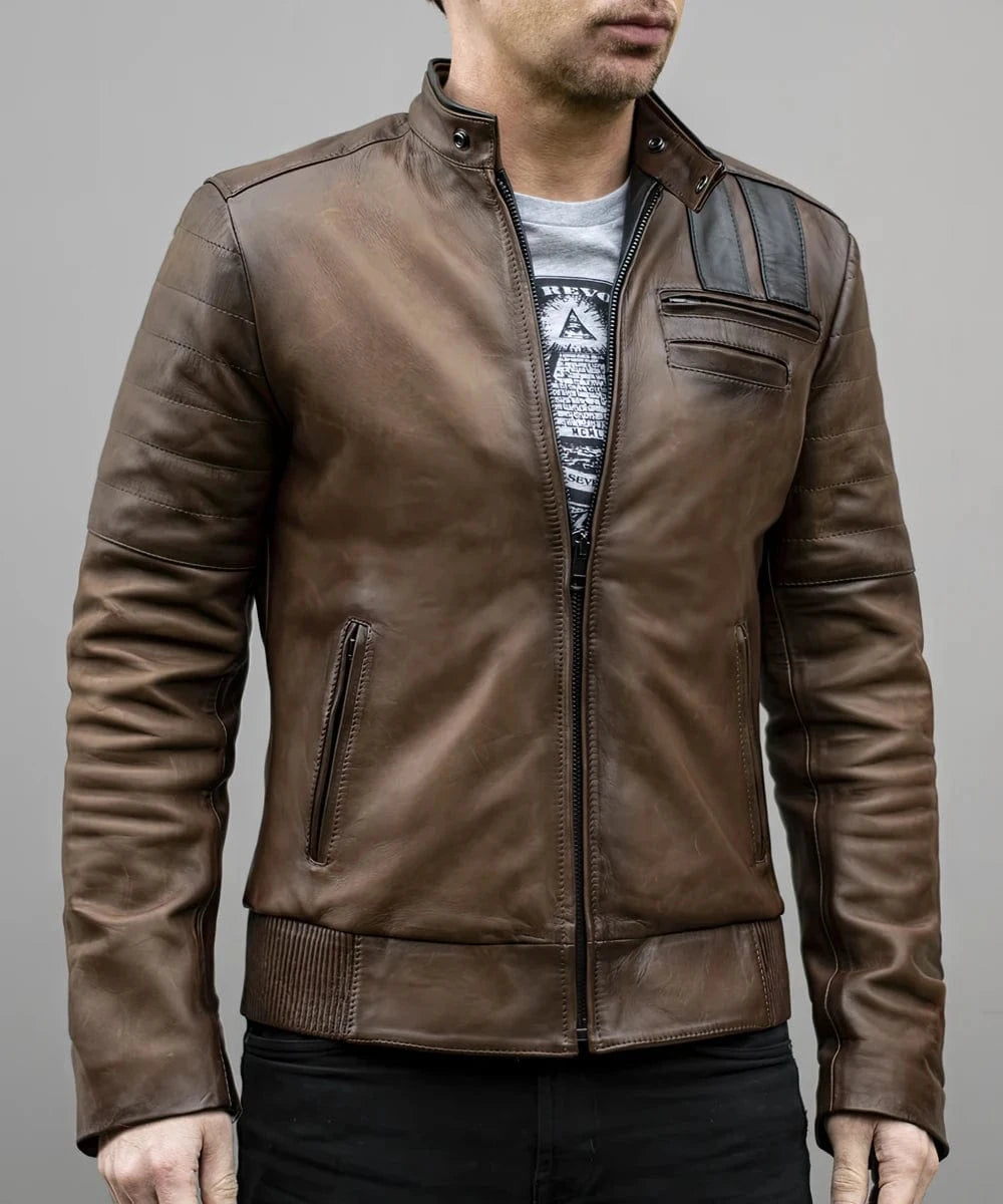 Model wearing vintage slim fit brown leather cafe racer jacket with biker inspired shoulder stripe detailing and quilted sleeve panels