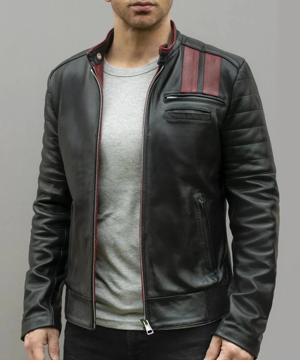 Model wearing vintage slim fit black leather cafe racer jacket with red stripe detailing and quilted shoulder panels