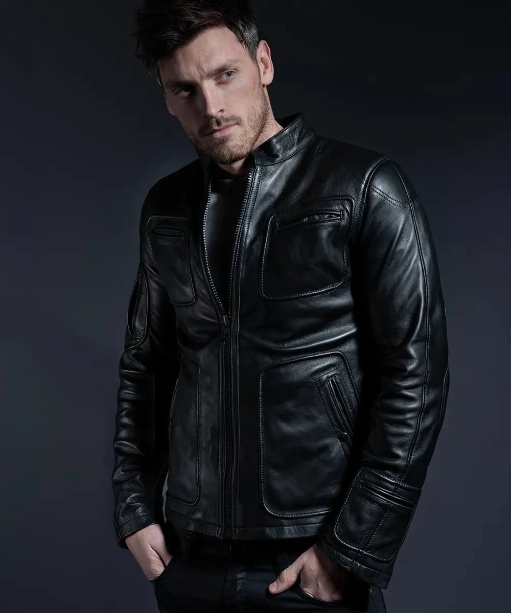 Male model wearing a black leather Kirk premium leather  jacket with modern slim fit styling, band collar, zip front, oversized chest pockets, and sci-fi inspired panel detailing
