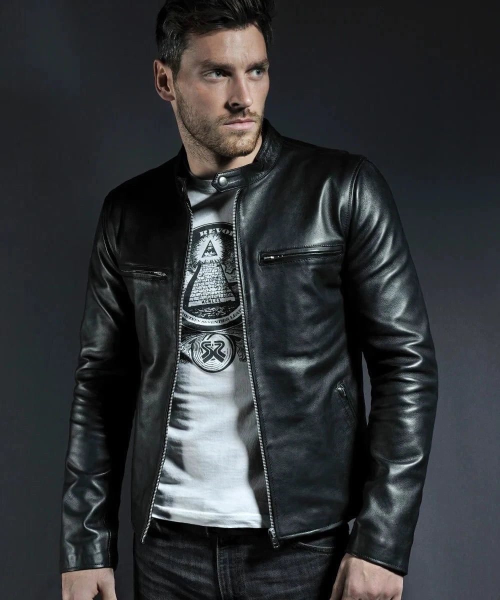 Model wearing black cafe racer leather jacket with stand collar and zip chest pockets