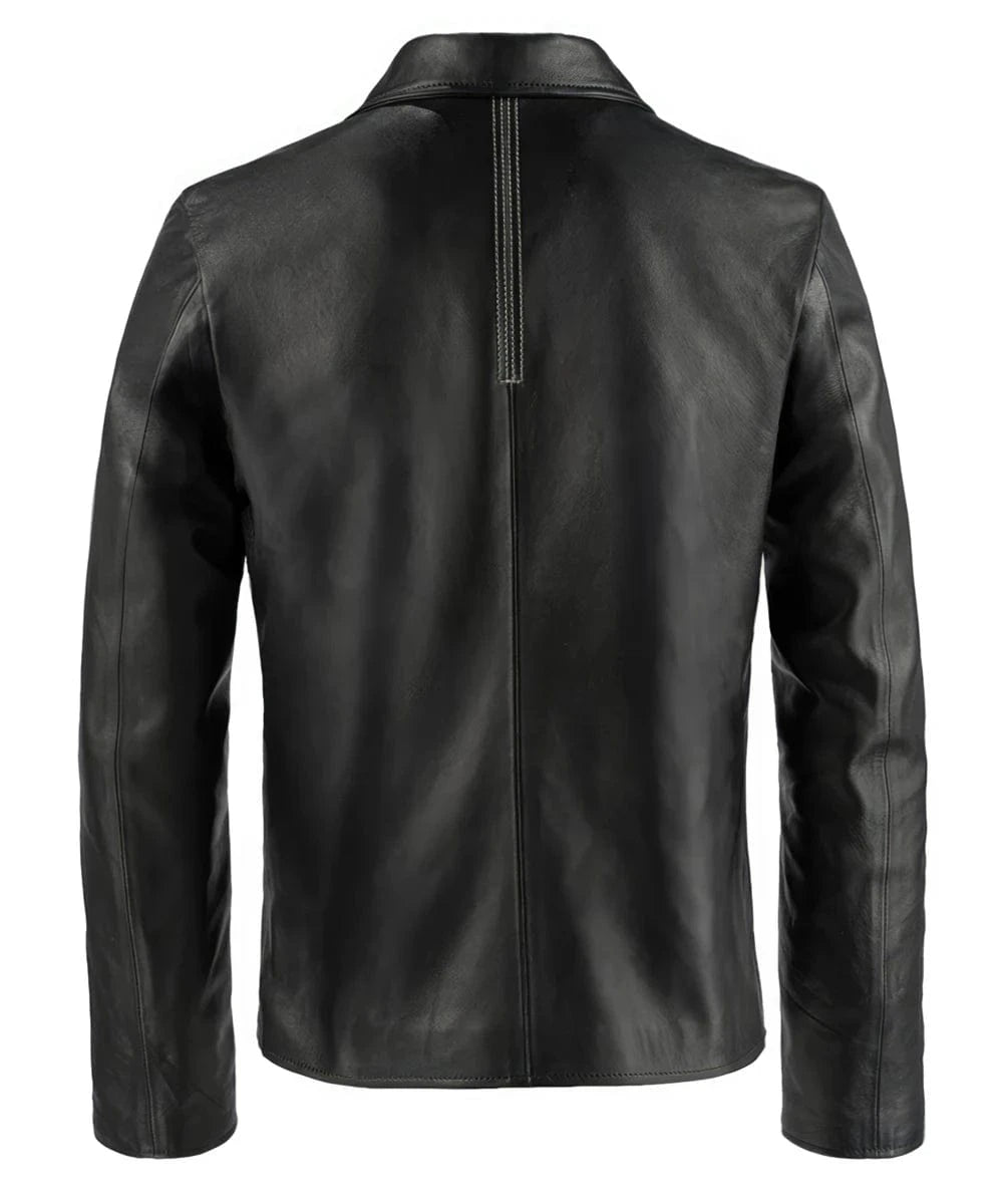 Rear view of the black leather Layer Cake movie replica jacket featuring a slim fit silhouette, clean vintage styling, minimalist seam detailing, and a center back stitched panel beneath the collar