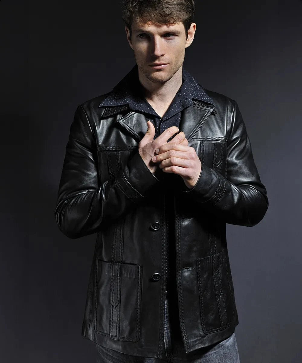 Male model wearing a black leather Life on Mars TV replica jacket with slim fit styling, vintage wide collar, button front closure, and retro 1970s inspired detailing