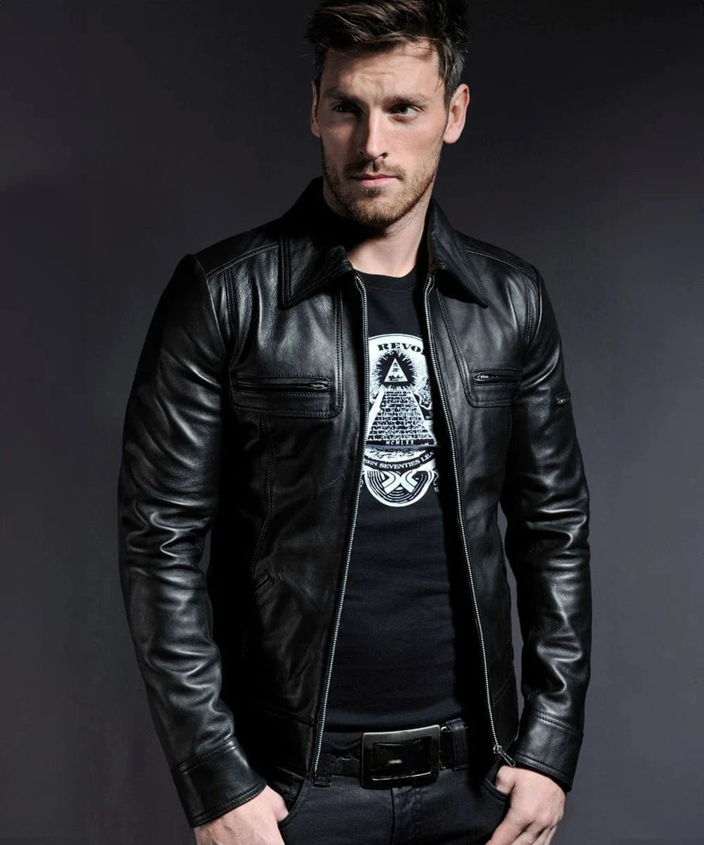 Model wearing vintage slim fit black leather jacket with retro pointed collar styling and zip chest pocket detailing