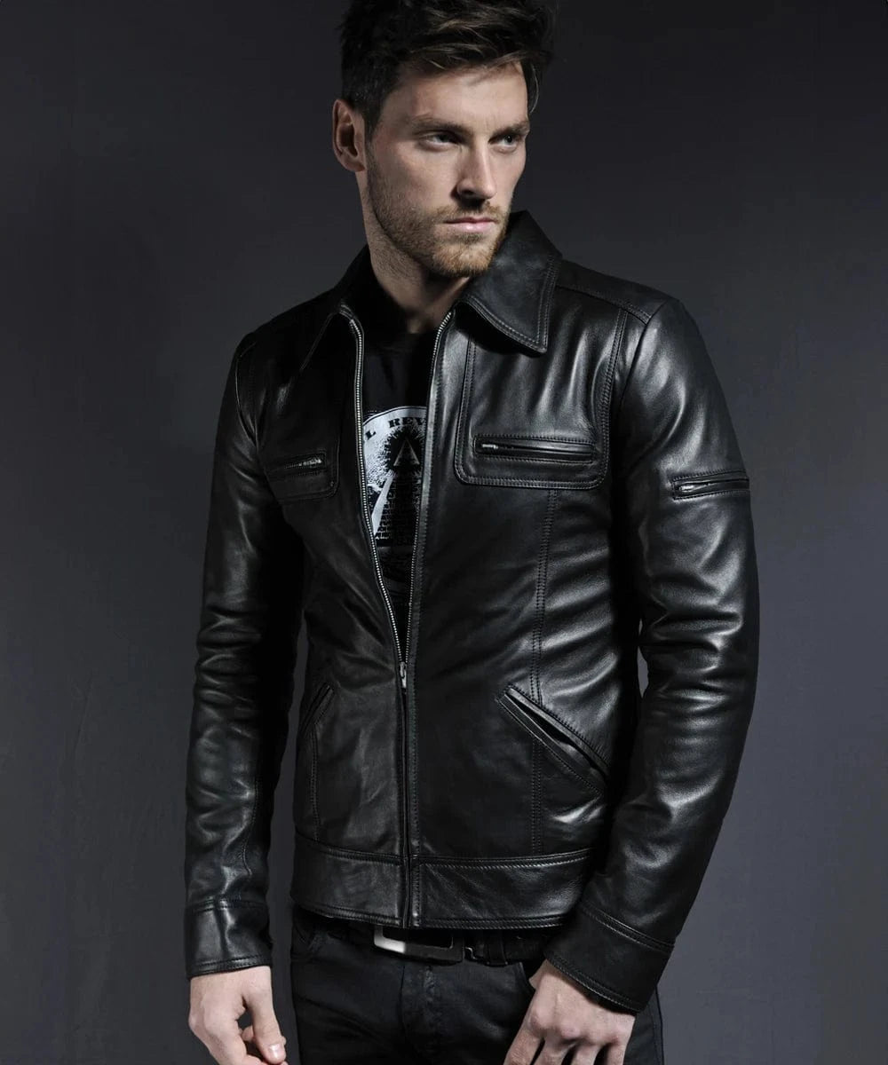 Model wearing vintage slim fit black leather jacket with retro pointed collar styling and zip chest pocket detailing