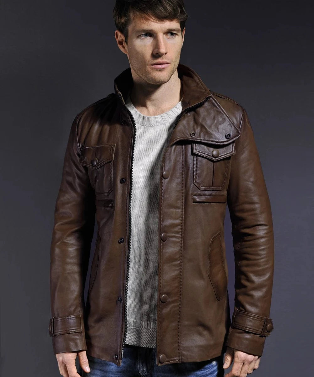 Model wearing vintage brown leather field jacket with slim fit styling and utility pocket detailing