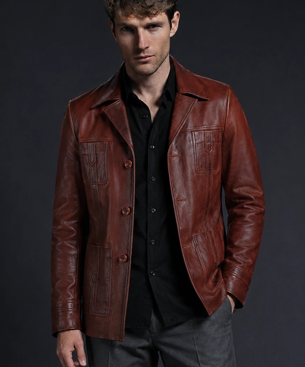 model wearing hip length vintage red leather jacket
