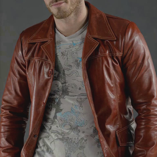 Model wearing Fight Club Tyler Durden replica red leather jacket with vintage styling and tinted sunglasses